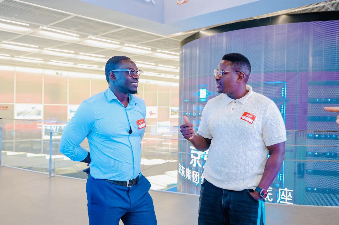 Oluwafemi touring a logistics technology facility in China